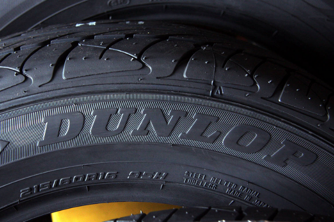 Dunlop logo on a black tyre