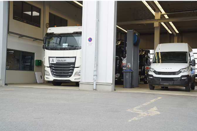 White truck and a white work van for an BAS Tyres alignment
