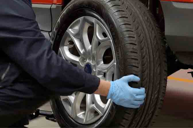 Tyre getting removed from a workvan
